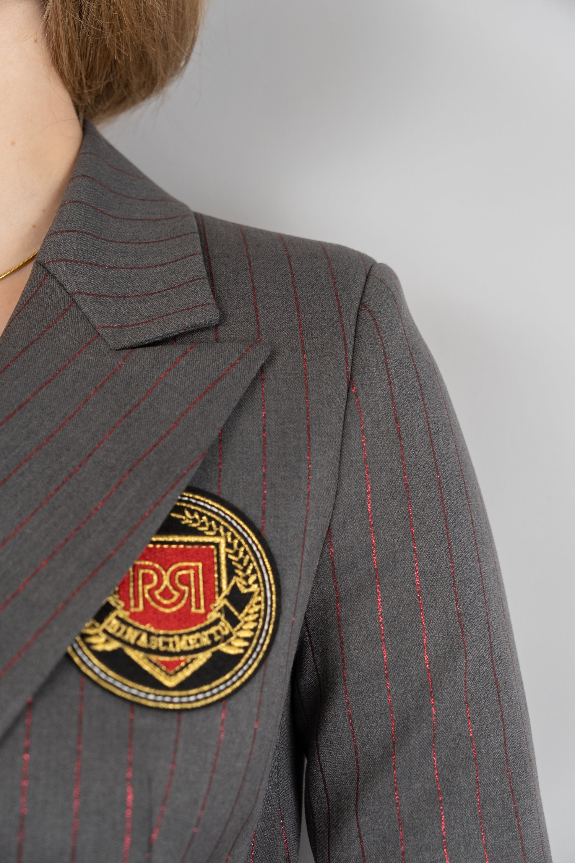 Double-Breasted Pinstripe Blazer With Crest Detail