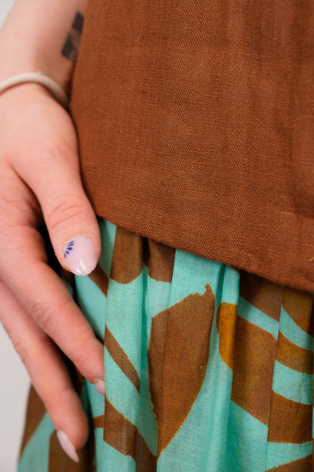Brown Sleeveless Dress with Aqua Printed Skirt