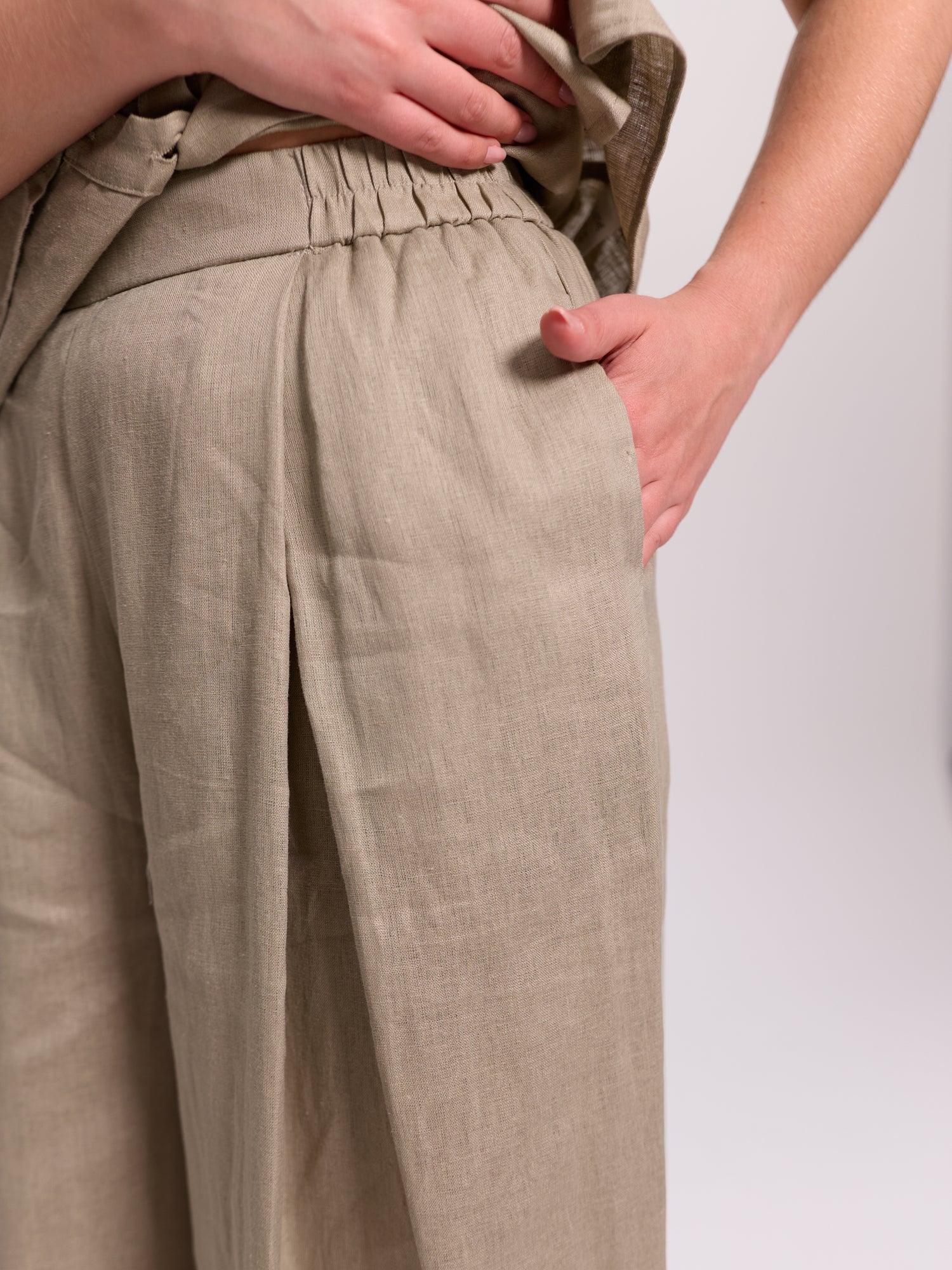 Beige Wide-Leg Pleated Linen Trousers